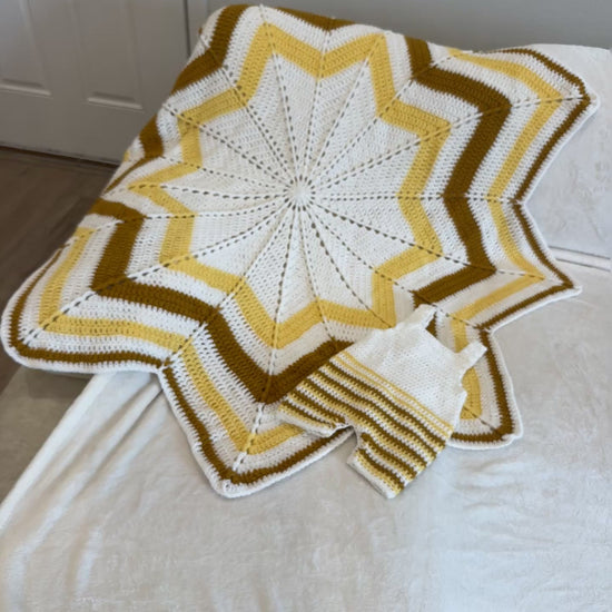 Golden star crochet baby keepsake set with star blanket and romper, handmade by The Crochet Corral